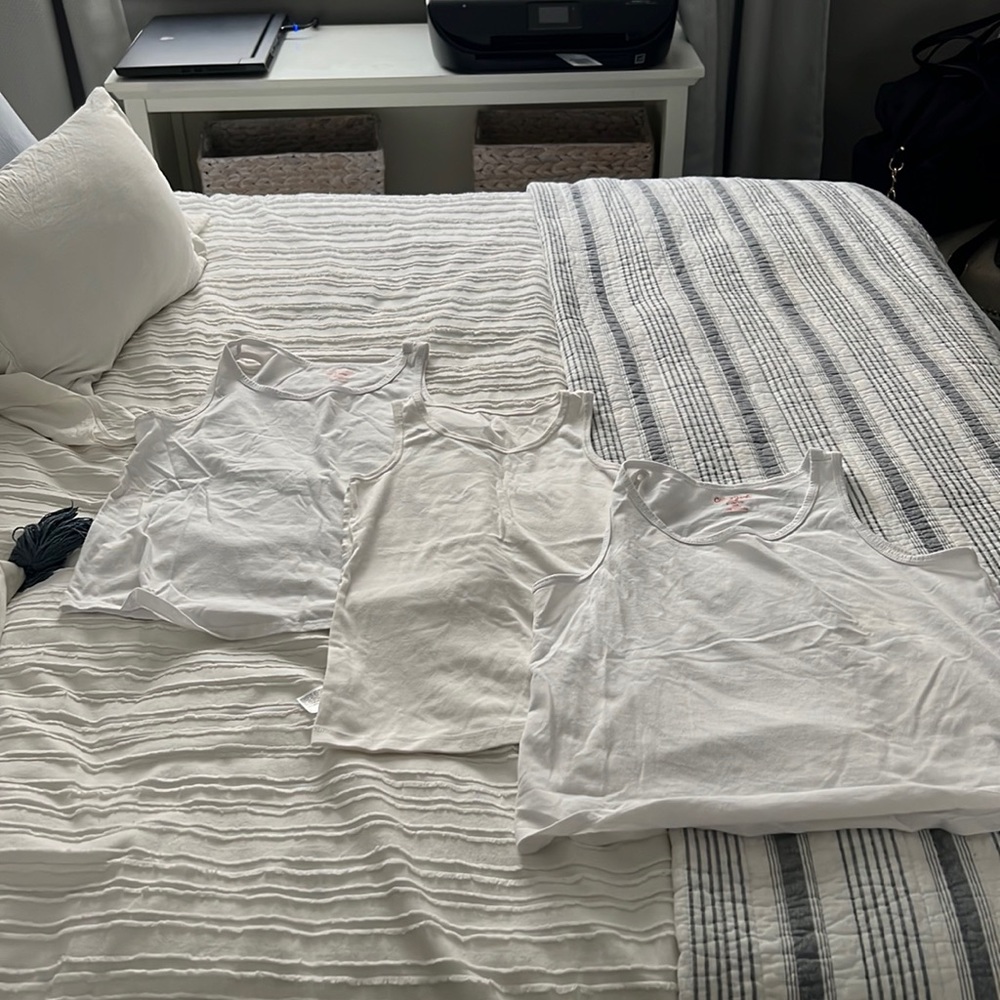 3 plain white tank tops